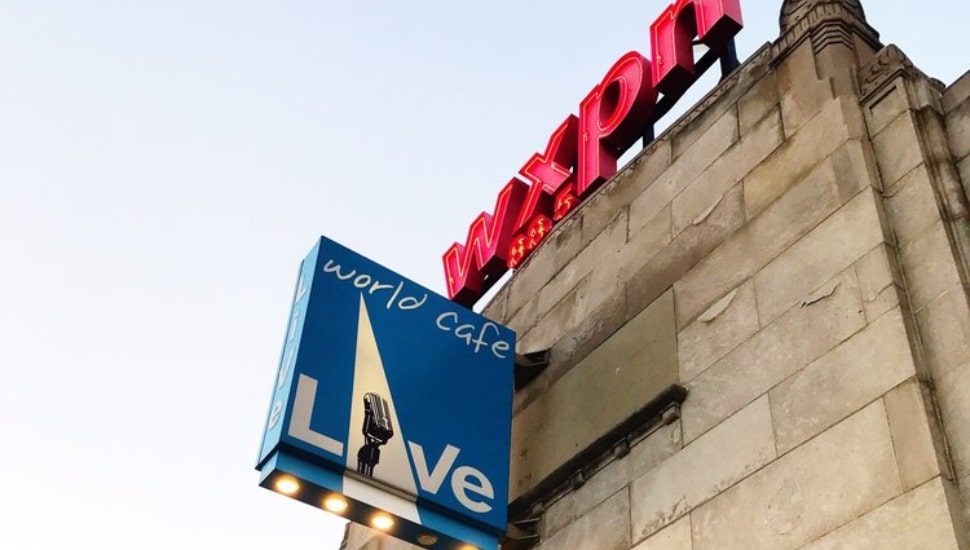 World Cafe Live exterior sign with WXPN sign ahead.