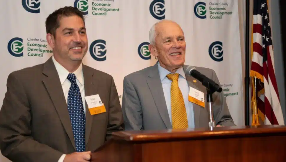 Michael Grigalonis and Gary Smith at CCEDC event at podium.