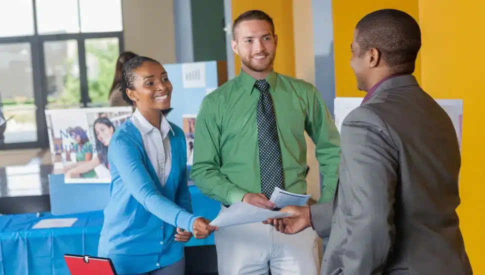 Young professionals at a Career fair.