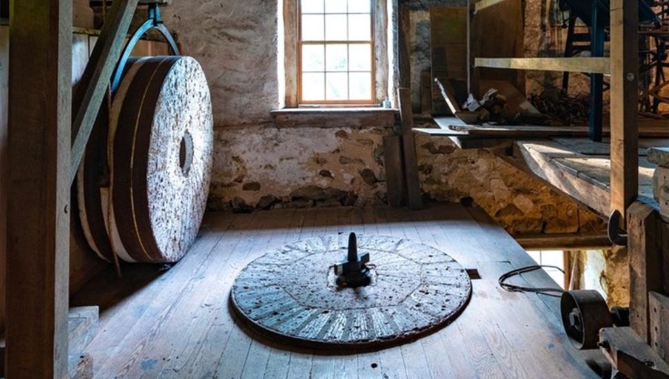 The set of historic wheat stones used at The Mill at Anselma.