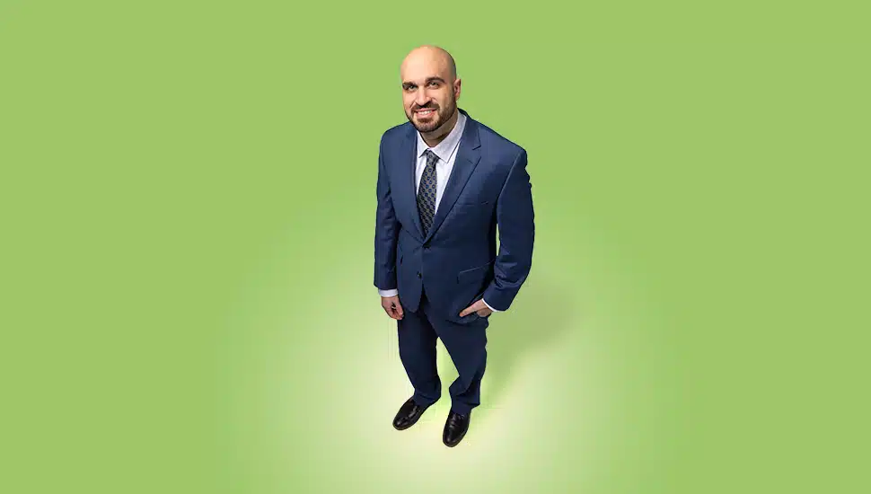 Young male lawyer in blue suit.