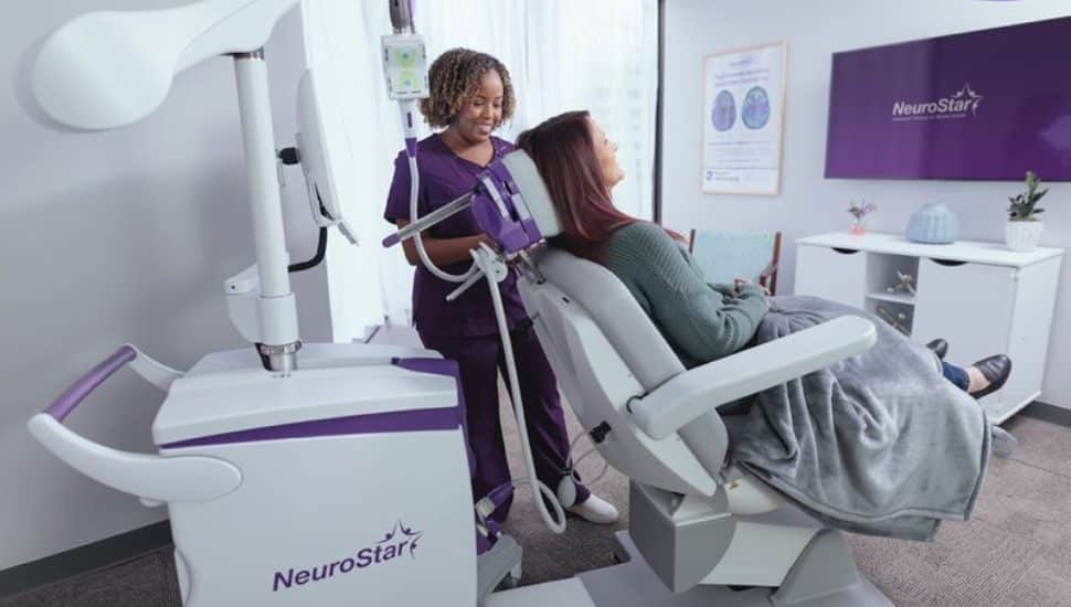 Neuronetics neurostar device. Nurse and patient.