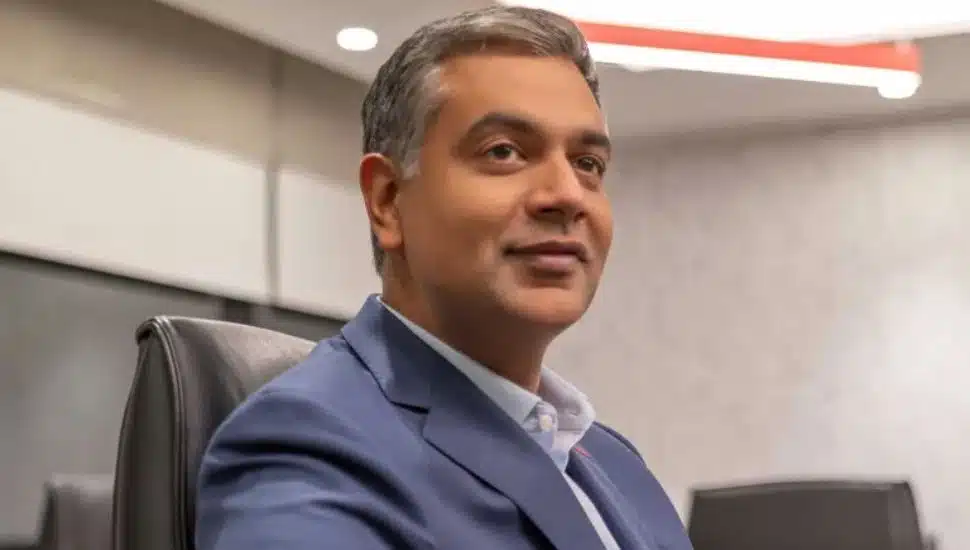 Sam Sidhu headshot from shoulders up.