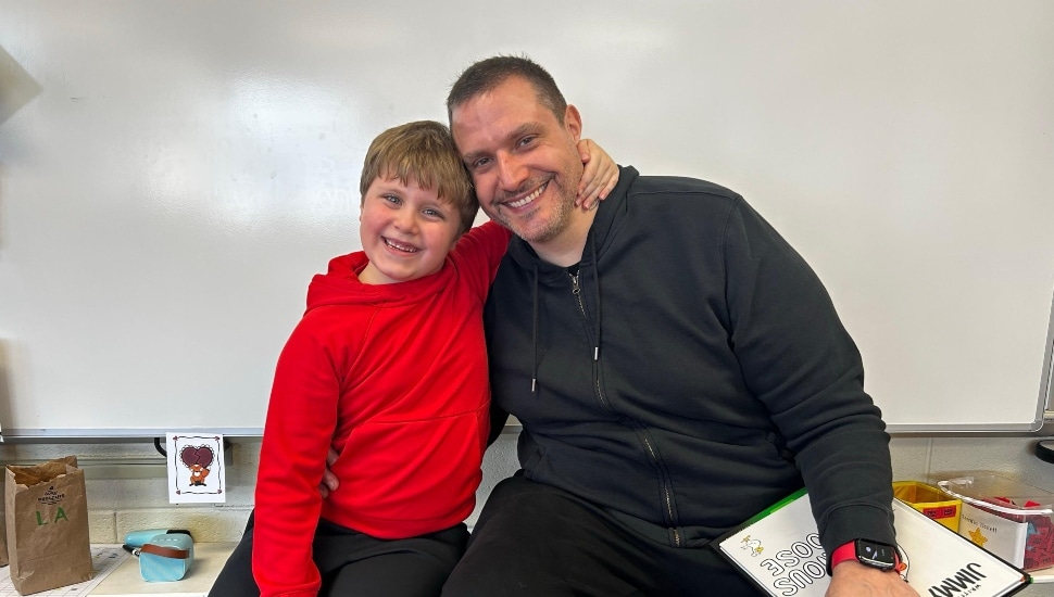 Steve DeLong hugs son Bradley.