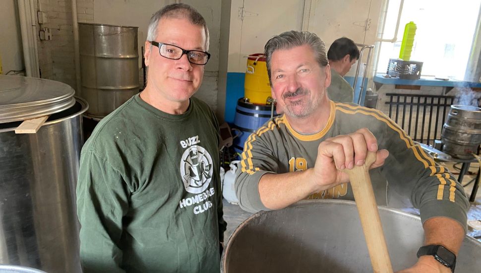 Brendan FitzGerald, right, with co-brewer Mark making brews last fall.