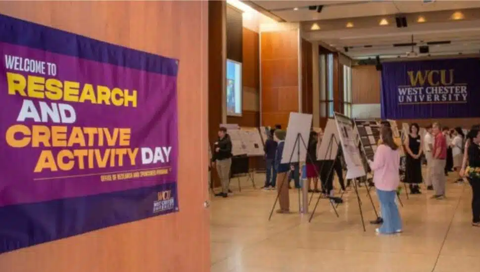 Students present research posters and discuss projects during West Chester University’s Research and Creative Activity Day.