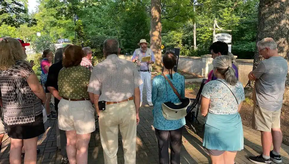 People grouped on walking tour.