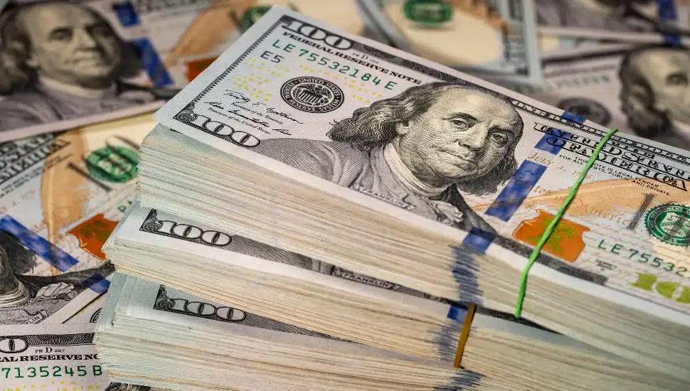 Stacks $100 bills.