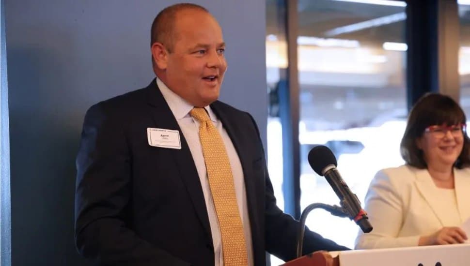 Aaron Pitts, chief commercial officer of BusinessPA, speaks at a Greater Philadelphia Chamber of Commerce event in 2024.