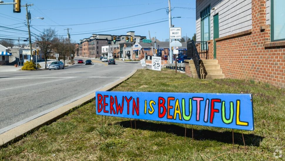 A lawn sign reading "Berwyn Is Beautiful" in downtown Berwyn.