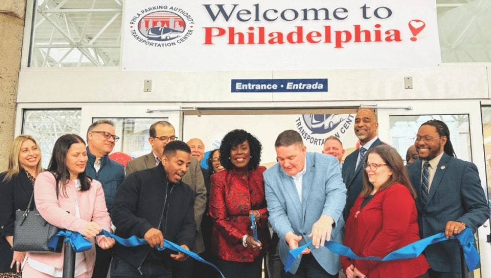 City officials cutting the ribbon inside new Philadelphia transportation cente.r