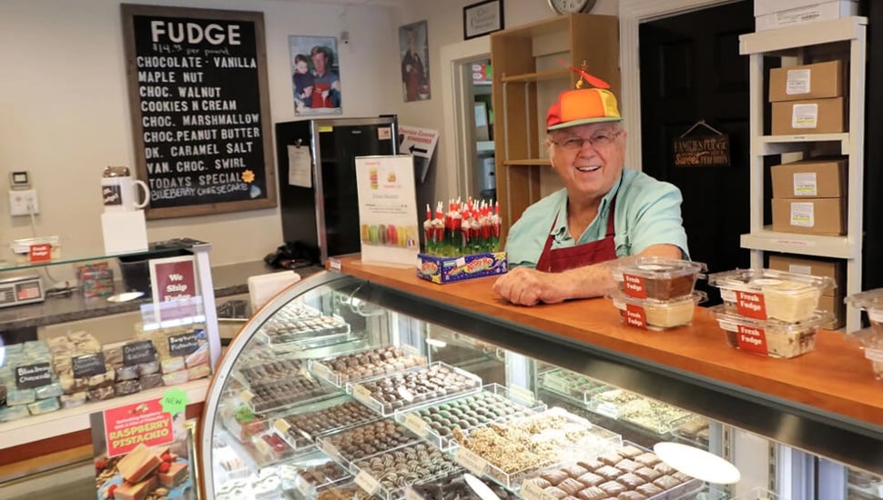 Skip Pietrak behind the counter at Skip's Candy Corner inside Peddler's Village in Lahaska.