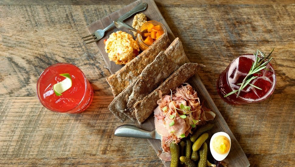 A charcuterie board and craft cocktails at Bloom Southern Kitchen.