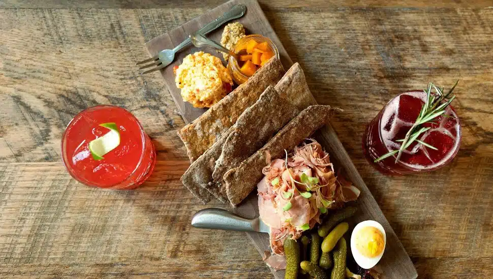 A charcuterie board and craft cocktails at Bloom Southern Kitchen.