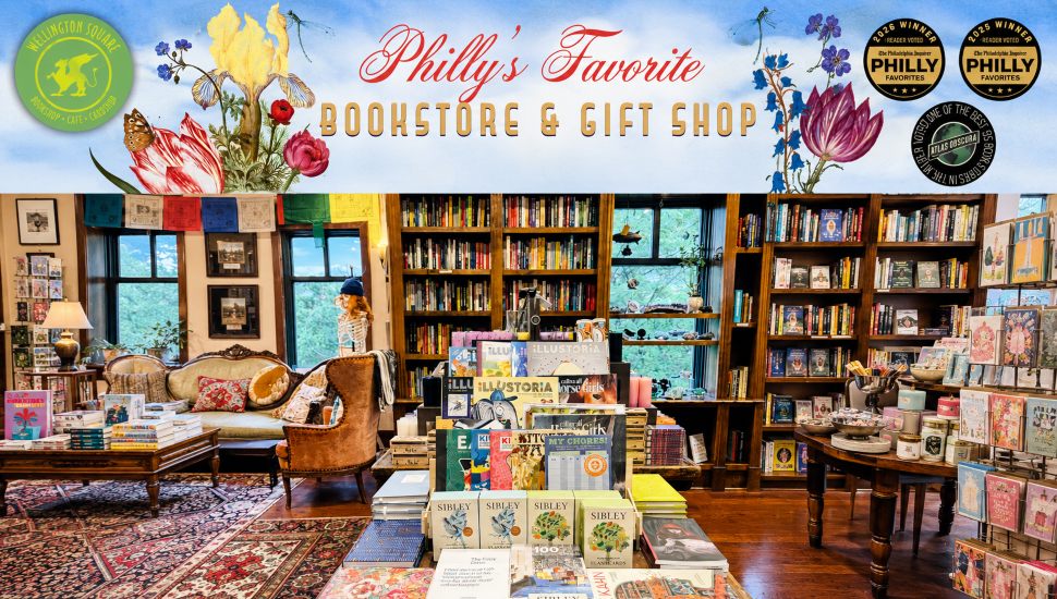 Interior view of Wellington Square Bookshop in Exton, Pennsylvania, featuring floor-to-ceiling bookshelves, curated book displays, gift items, comfortable seating, and award-winning bookstore branding.