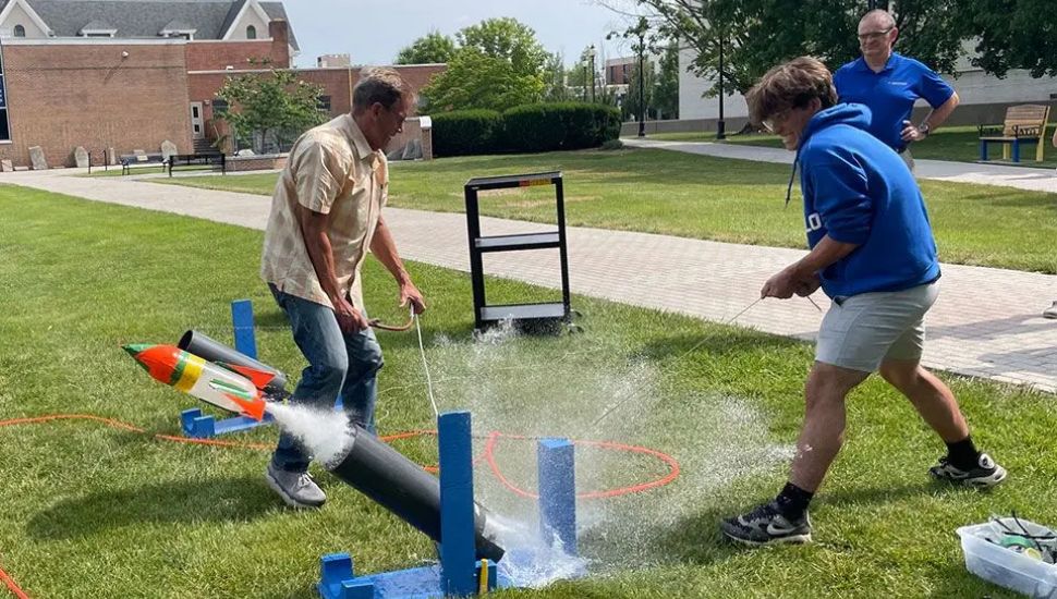 High school students at Widener's engineering camp launch rockets.