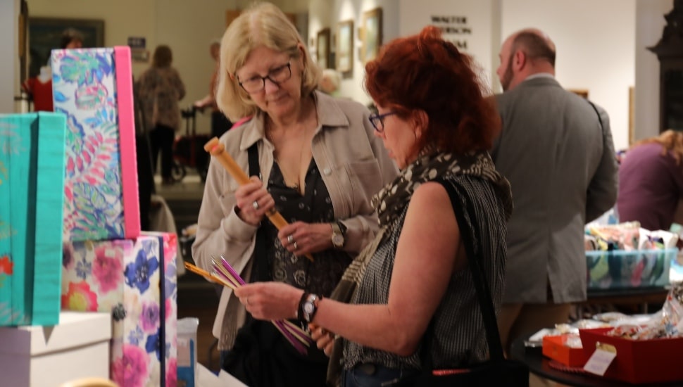 Shoppers at the Penn Dry Goods at the rummage sale.