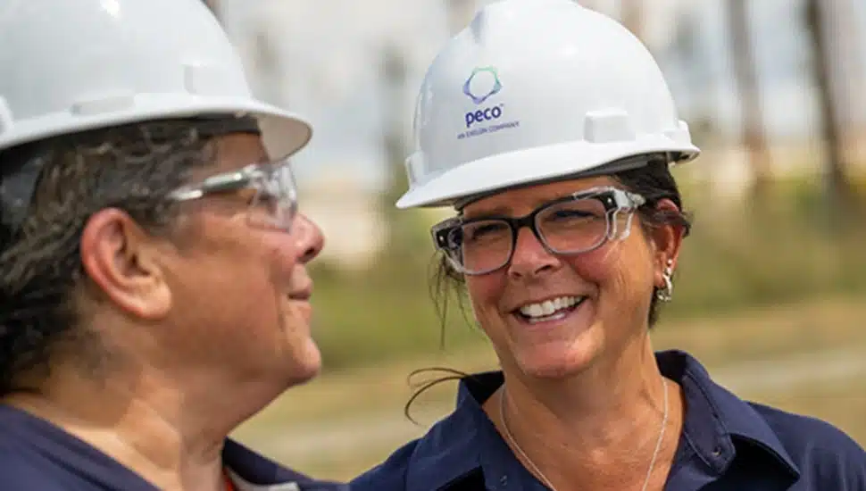 Closeup of female utility workers.