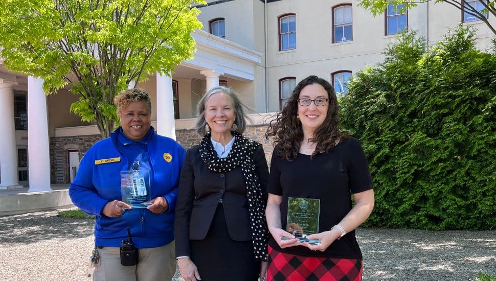 William David Eckard Jr. Award winner Lt. Vontel Green (left) with Widener President Stacey Robertson (center) and William David Eckard Jr. Award winner Erica Austin.